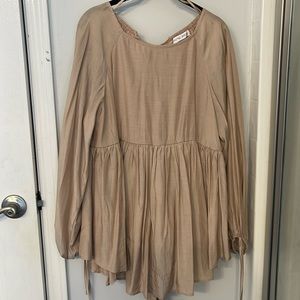 Nude top. Romantic and Flowy. Dressy. Shinier material.